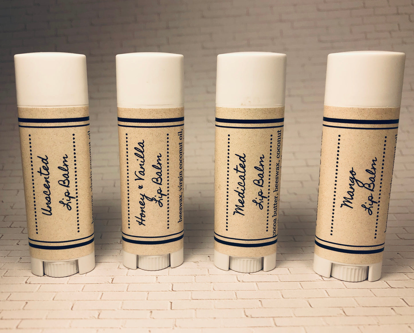 Tubes of all-natural lip balm flavors from Humble Bee Farms. All Natural Lip Balm conditions, moisturizes, heals and protects dry damaged lips.