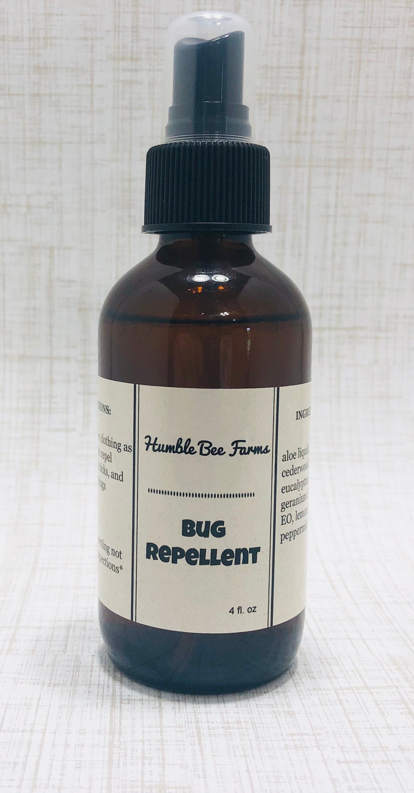 A bottle of Humble Bee Farms Bug Repellant.