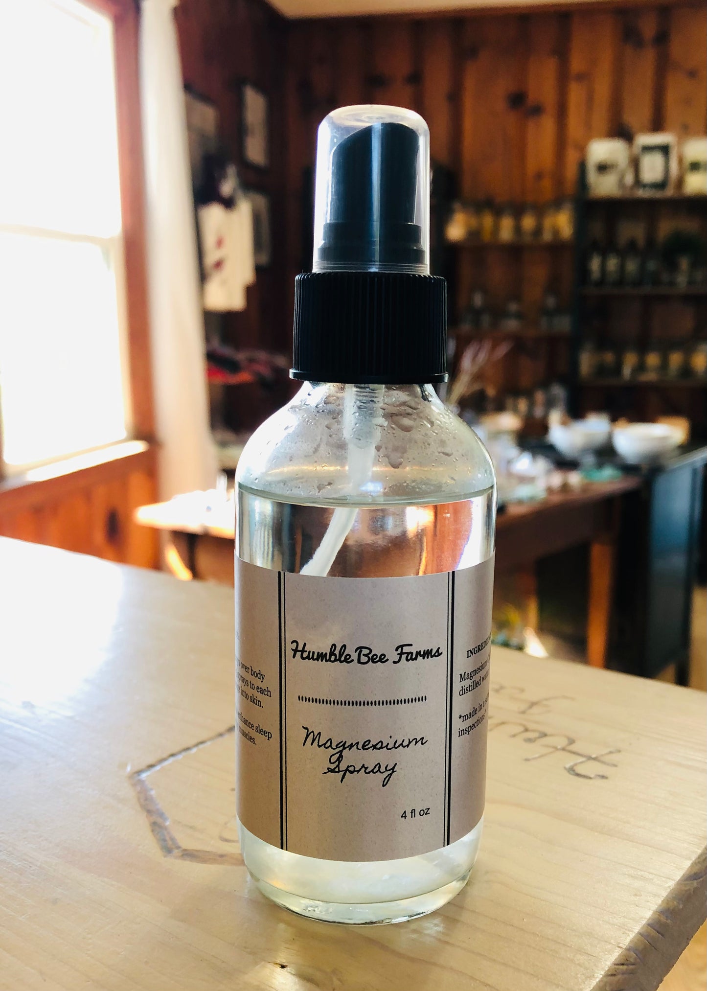 Bottle of Magnesium Spray from Humble Bee Farms. Soothe tired muscles and calm your body with our pure Magnesium Spray, crafted from high-quality magnesium flakes.