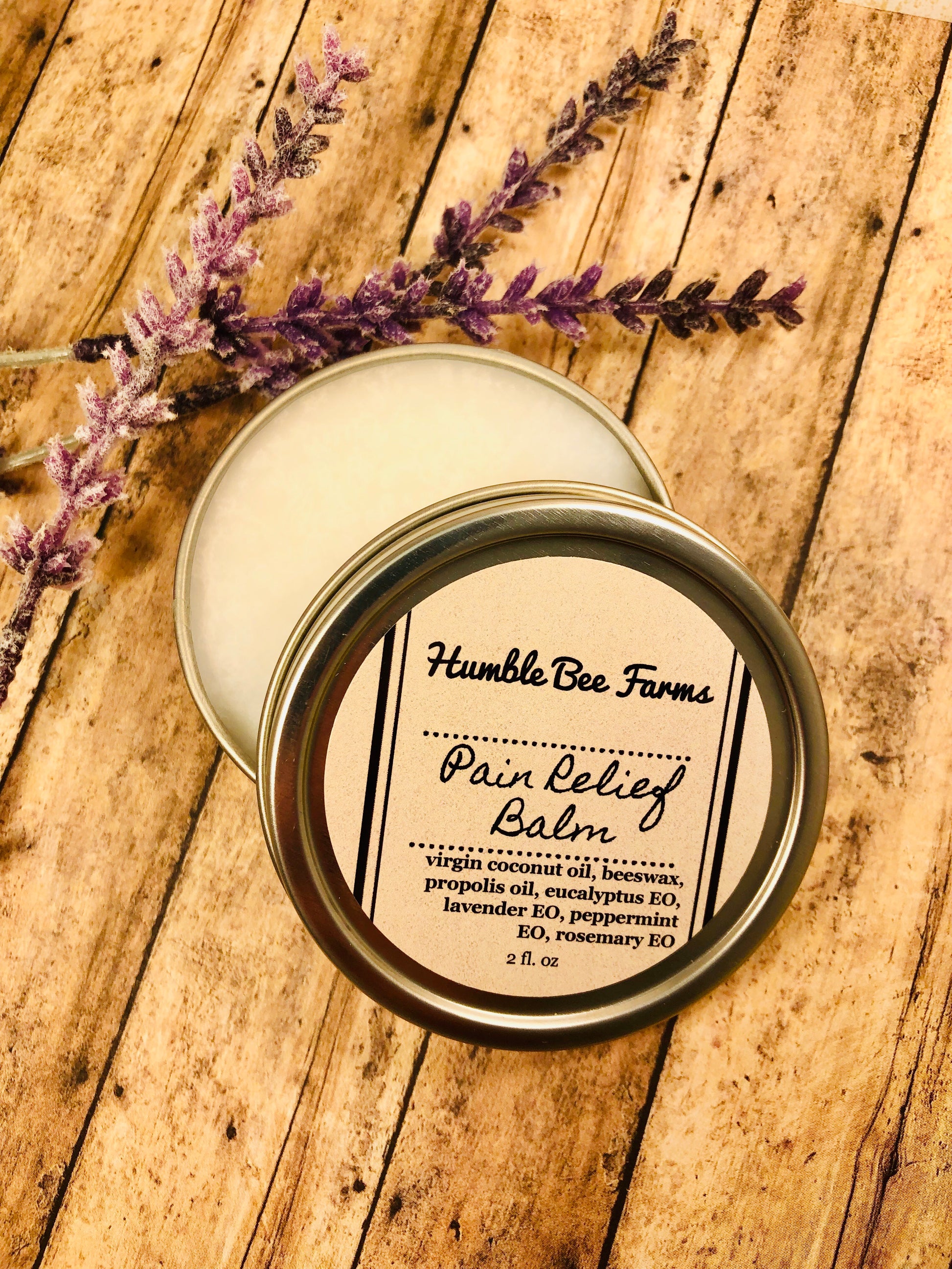 A tin of Pain Relief Balm from Humble Bee Farms. Pain Relief Balm is an all natural alternative to toxic muscle rubs.